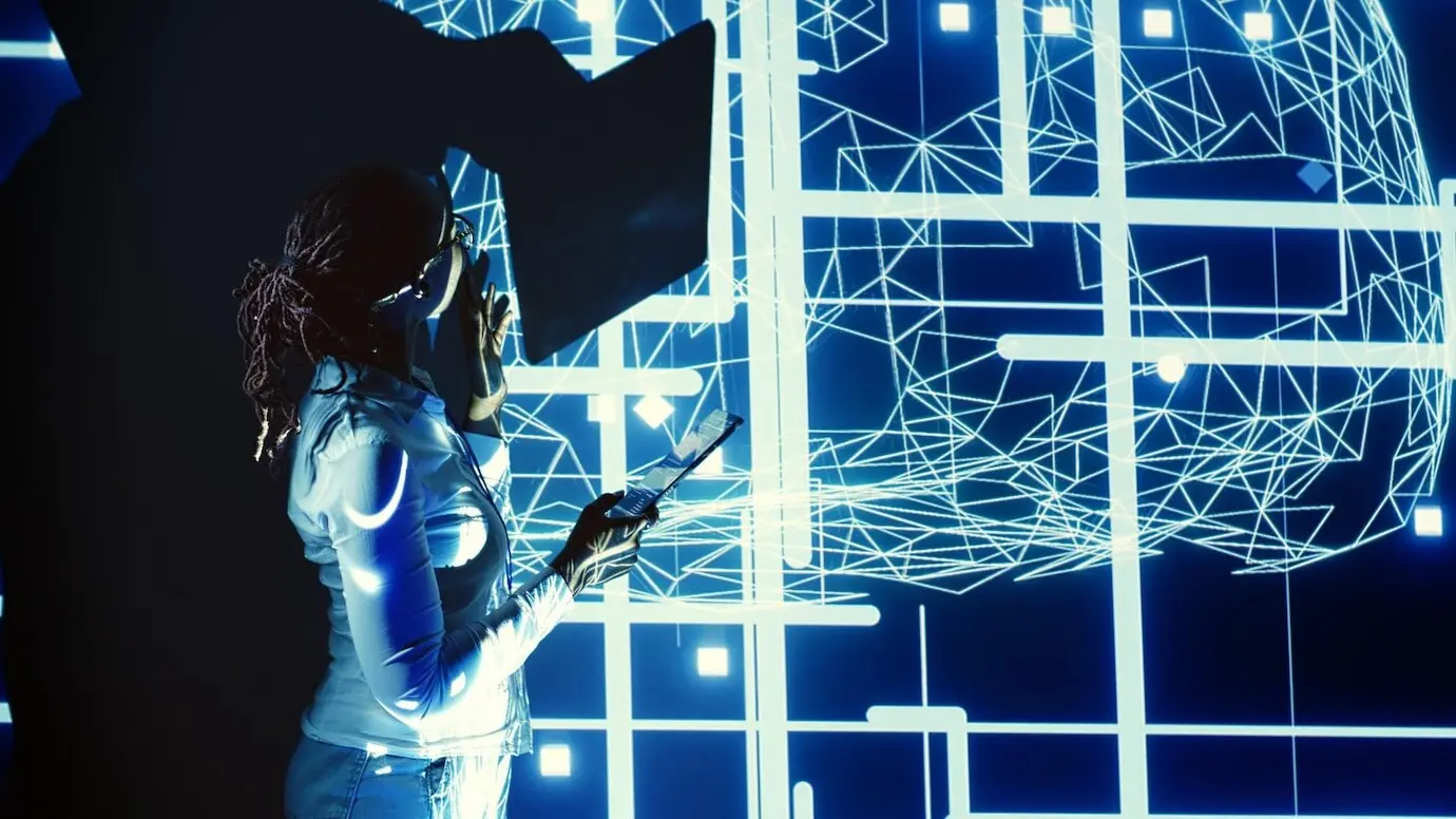 Ein Systemadministrator, der in einer KI-Serverfarm arbeitet.